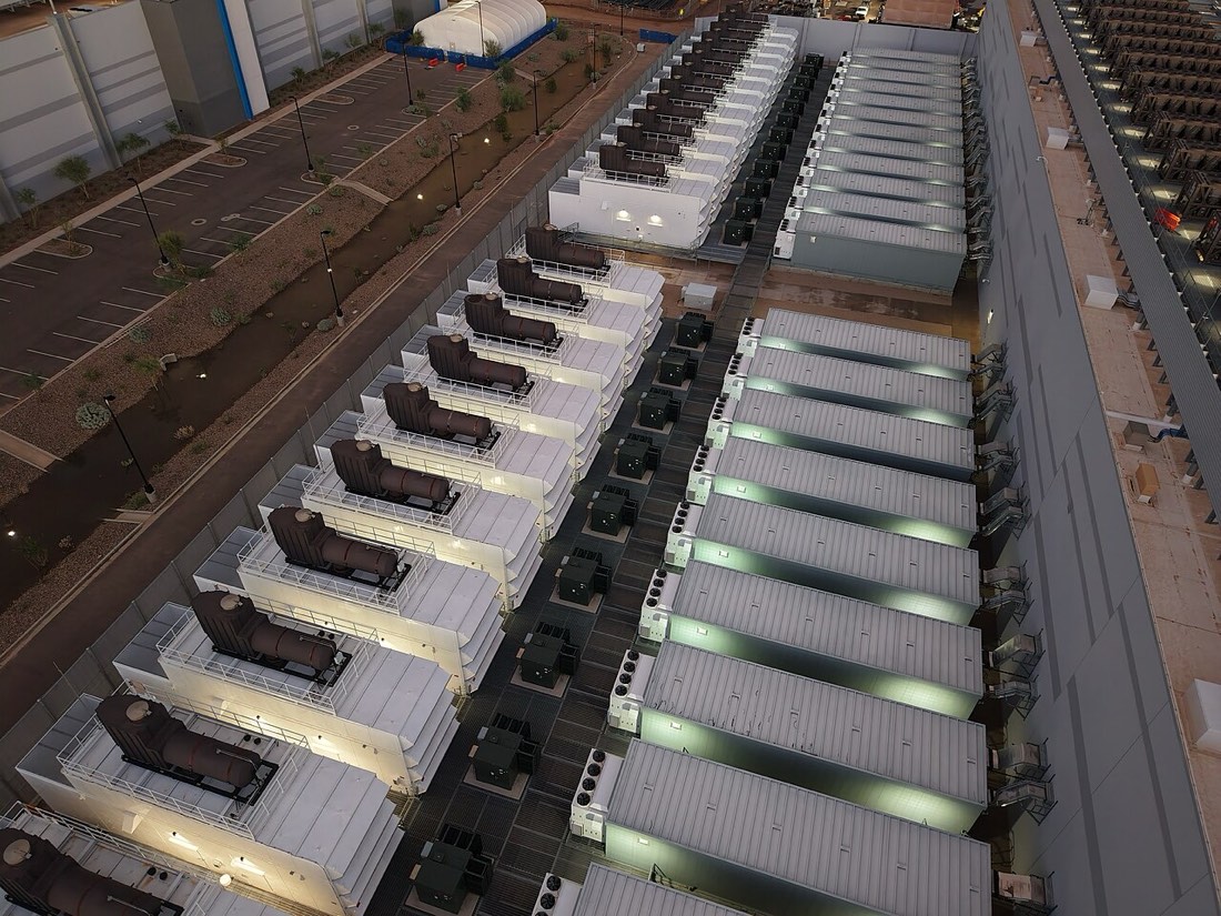 Rows of standby generators at a data center campus