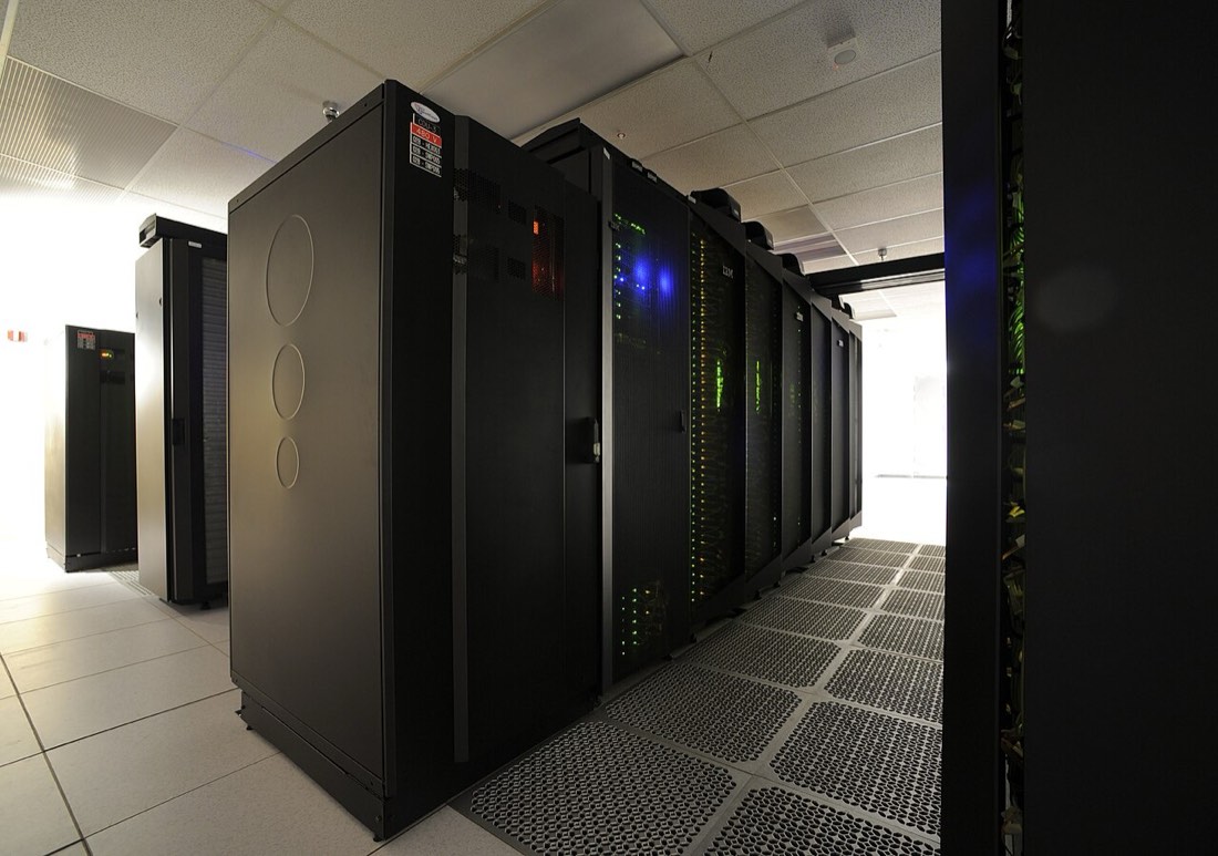 Row of server racks in a data hall